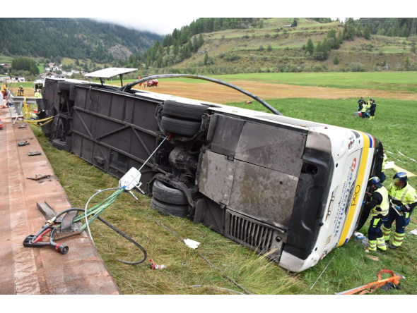 This handout photograph released on September 11, 2026 by the Swiss Police of Canton Graubunden shows the wreckage of a bus after an accident in between the village of Susch and Zernez, eastern Switzerland, on September 10, 2026. (Photo by Handout / KANTONPOLIZEI GRAUBUNDEN / AFP) 