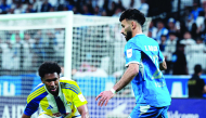 Action during the match between Al Gharafa and Al Hilal.