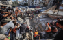 Rescuers excavate rubble to retrieve bodies from a collapsed building in the Tal al-Hawa area of Gaza City on September 16, 2026. (Photo by Omar Al-Qattaa / AFP)
