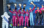 Team Qatar drivers celebrate on the podium. 