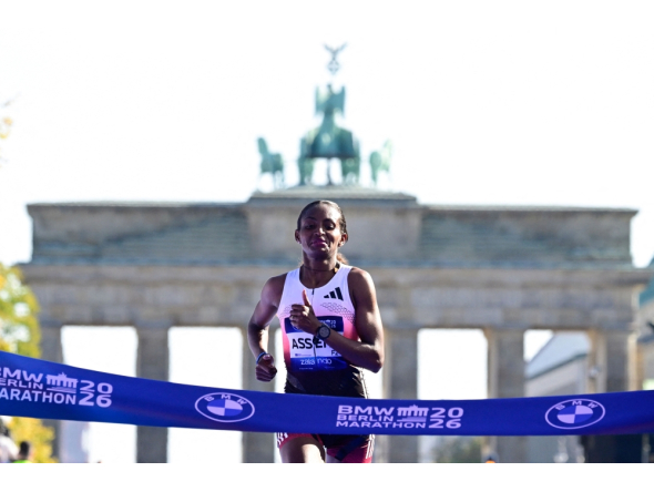 Ethiopia's Tigst Assefa crosses the finish line to win the women's race of 52nd Berlin Marathon in Berlin, Germany on September 27, 2026. (Photo by John MacDougall / AFP)
 