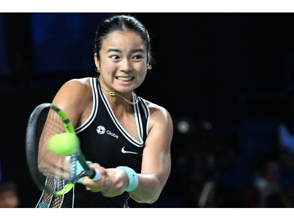 Philippines Alexandra Eala hits a return against Russia's Tatiana Prozorova during the WTA Singapore Open Tennis round 16 in Singapore on September 24, 2026. (Photo by Roslan Rahman / AFP)

