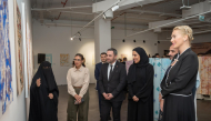 Officials and visitors during the exhibition.