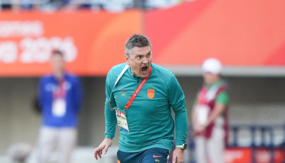 Antonio Puche, head coach of China, reacts during the men's football semifinal between China and South Korea at 20th Asian Games Aichi-Nagoya 2026 in Osaka, Japan, Sept. 30, 2026. (Xinhua/Lui Siu Wai)
