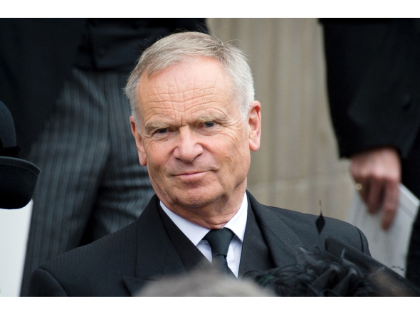 (Files) British author and former MP Jeffrey Archer leaves St Paul's Cathedral at the end of British former prime minister Margaret Thatchers ceremonial funeral in central London on April 17, 2013. (Photo by Leon Neal / AFP)