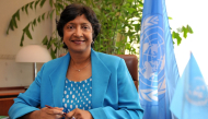 (FILES) New United Nations High Commissioner for Human Rights, South African judge Navanethem (Navi) Pillay poses in her office at the Palais Wilson, headquarters of the specialised UN agency as she takes up her post on Spetember 1, 2008 in Geneva. (Photo by Fabrice COFFRINI / AFP)