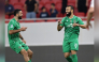Al Ahli’s Naim Sliti (right) celebrates after scoring a goal. 
