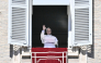 Pope Leo XIV waves to faithful during the Angelus prayer from the window of the Apostolic Palace overlooking St. Peter's Square, in the Vatican, on October 11, 2026. (Photo by Filippo MONTEFORTE / AFP)