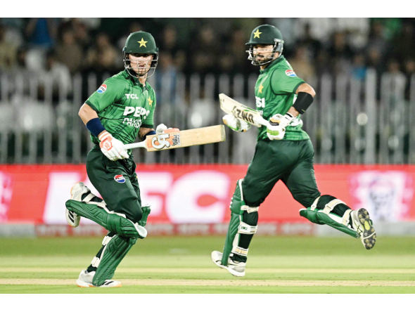 Pakistan’s captain Sahibzada Farhan (right) and Maaz Sadaqat run between the wickets during the second T20I.
