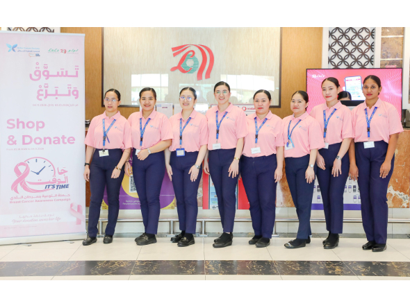 LuLu employees representing ‘Shop and Donate’ campaign.