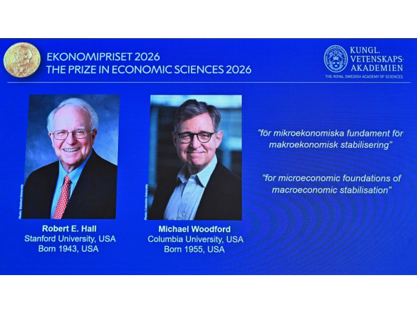The winners of the 2026 Sveriges Riksbank Prize in Economic Sciences in Memory of Alfred Nobel, Robert E Hall (L) and Michael Woodford, are displayed on a screen at the Royal Swedish Academy of Sciences in Stockholm on October 12, 2026. Photo by Anders Wiklund / TT NEWS AGENCY / AFP 