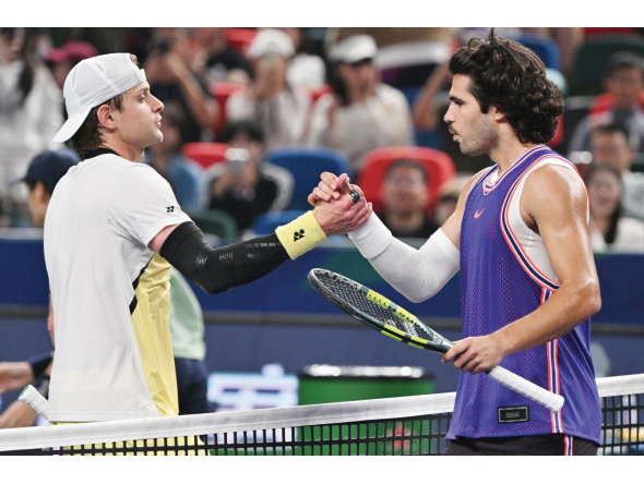 Belgium’s Zizou Bergs (left) shakes hands with Spain’s Carlos Alcaraz at the end of their match.