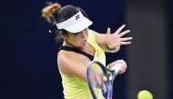 China’s Shi Han hits a return to Philippines’ Alexandra Eala.