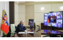 In this pool photograph distributed by the Russian state agency Sputnik, Russia's President Vladimir Putin chairs a meeting on cybersecurity with government and business members via videolink at the Novo-Ogaryovo residence outside Moscow on October 14, 2026. (Photo by Mikhail METZEL / POOL / AFP)
