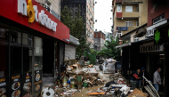 A photograph taken on October 16, 2026, shows a flooded street the day after heavy rainfall in the Ayazaga district of Istanbul. Photo by Yasin Akgul / AFP
