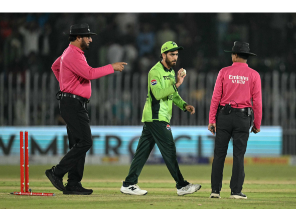 Pakistan's Arafat Minhas (C) celebrates after taking his sixth wicket to dismiss England's Adil Rashid as umpires Pakistan's Faisal Afridi (L) and Bangladesh's Sharfuddoula react during the one-day international (ODI) tri-series cricket match between Pakistan and England at the Rawalpindi Cricket Stadium in Rawalpindi on October 20, 2026. (Photo by Aamir QURESHI / AFP)