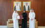 Minister of Education and Higher Education H E Lolwah bint Rashid bin Mohammed Al Khater presenting accreditation certificate to President of UDST Dr. Salem Al-Naemi.