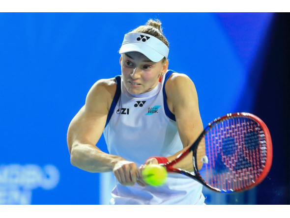 Kazakhstan's Elena Rybakina hits a return to Russia's Diana Shnaider during their women's singles semifinal match on October 24, 2026. (Photo by CN-STR / AFP)