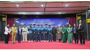 Birla Public School principal and staff members with the winning students.