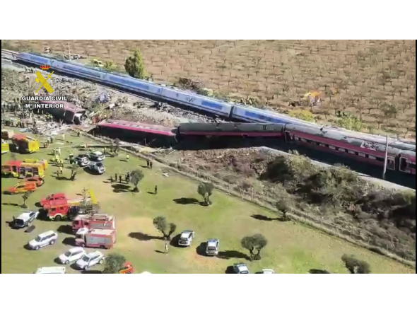 This still image from video taken and released by Spain's Civil Guard on October 28, 2026 shows an aerial scene of a train crash between a high speed Renfe AVE train and Iryo train around 150kms south of Madrid between Urda and Los Yebenes in the province of Toledo. (Photo by Handout / Guardia Civil / AFP)