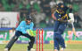 Sri Lanka's Avishka Fernando (R) plays a shot during the one-day international (ODI) tri-series cricket match between England and Sri Lanka at the Gaddafi stadium in Lahore on October 29, 2026. (Photo by ARIF ALI / AFP)