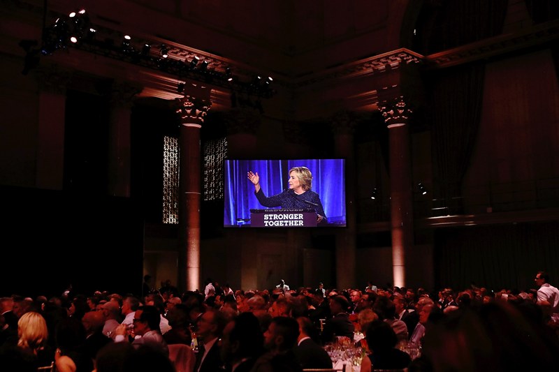 Democratic presidential nominee former Secretary of State Hillary Clinton is seen on a monitor as she speaks at Cipriani Club on September 9, 2016 in New York City. (Justin Sullivan/Getty Images/AFP)