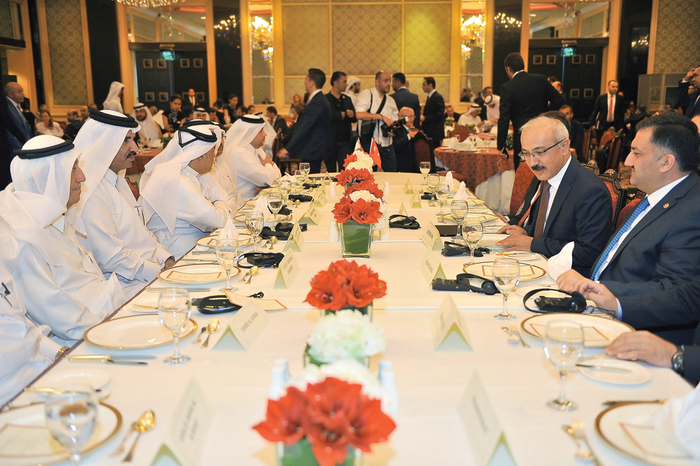 Turkish Minister of Development Lutfi Elvan and Qatar Chamber Vice-Chairman Muhammed bin Ahmed bin Towar Al Kuwari with Qatari businessmen and their Turkish counterparts in Doha yesterday. Pic: Baher Amin/The Peninsula