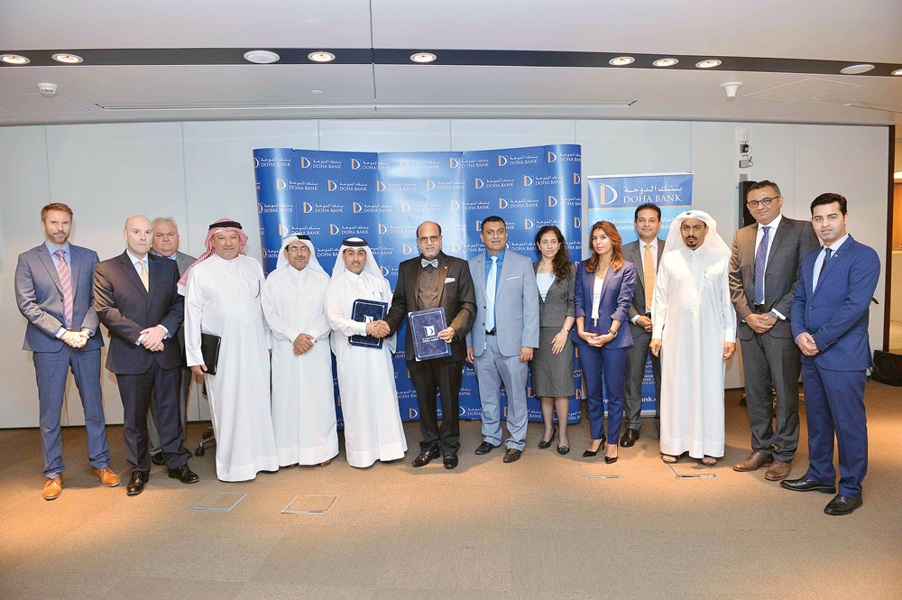Dr. Abdulaziz Al Horr (sixth left) and Dr R Seetharaman (centre) with other officials at the event, yesterday