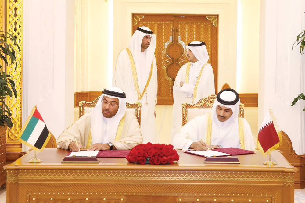 The Prime Minister and Interior Minister H E Sheikh Abdullah bin Nasser Bin Khalifa Al Thani and Minister of State in the United Arab Emirates and the Chief Executive Officer of Abu Dhabi National Oil Company (ADNOC). Dr. Sultan Bin Ahmed Al Jaber watchin