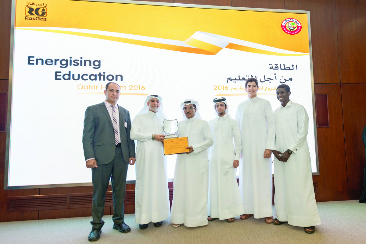 Energising Education’ competition winners awarded by RasGas representatives and the Ministry of Education and Higher Education for their projects on helium.