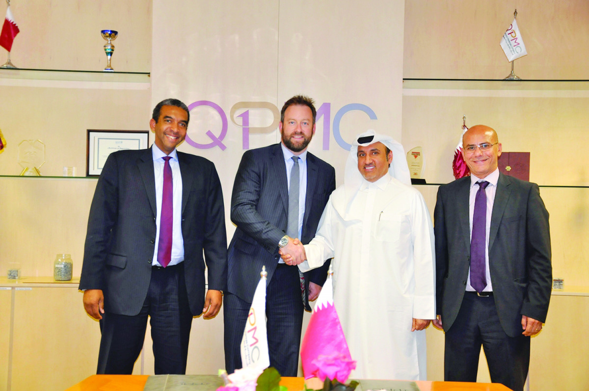 Eisa Al Hammadi (second right), CEO of QPMC at the agreement signing ceremony.