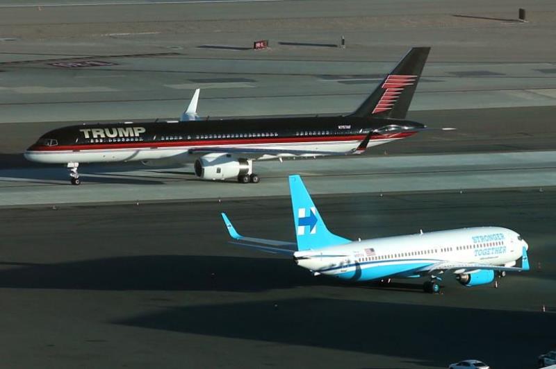 Donald Trump's campaign plane passes Hillary Clinton's campaign plane as it lands in Las Vegas, Nevada. Reuters/Lucy Nicholson