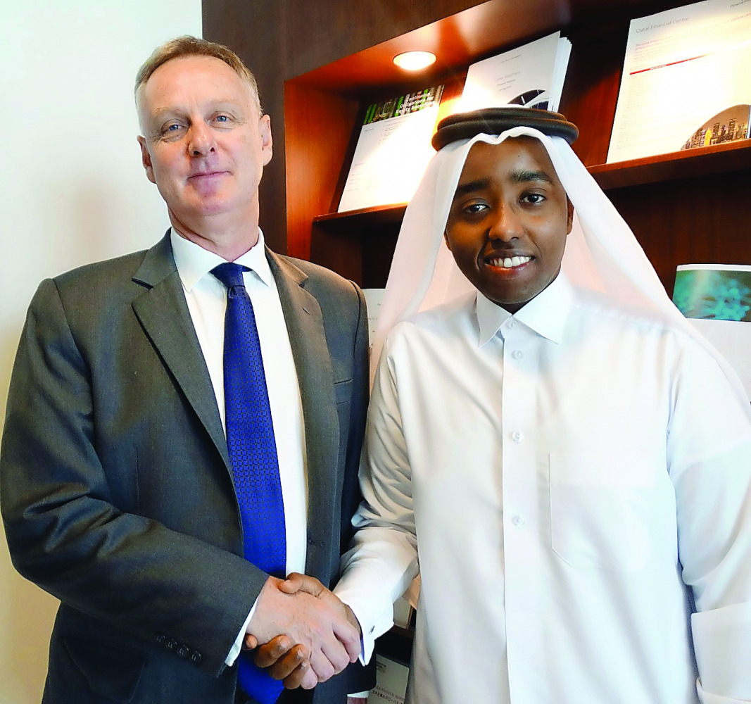 Roger Phillips of Pinsent Masons law firm and intern Mohammed Ali from Qatar University. 