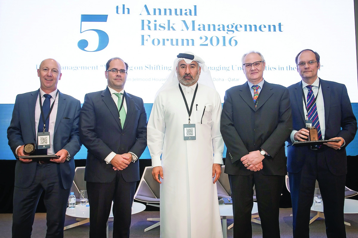 Officials pose for a group picture.