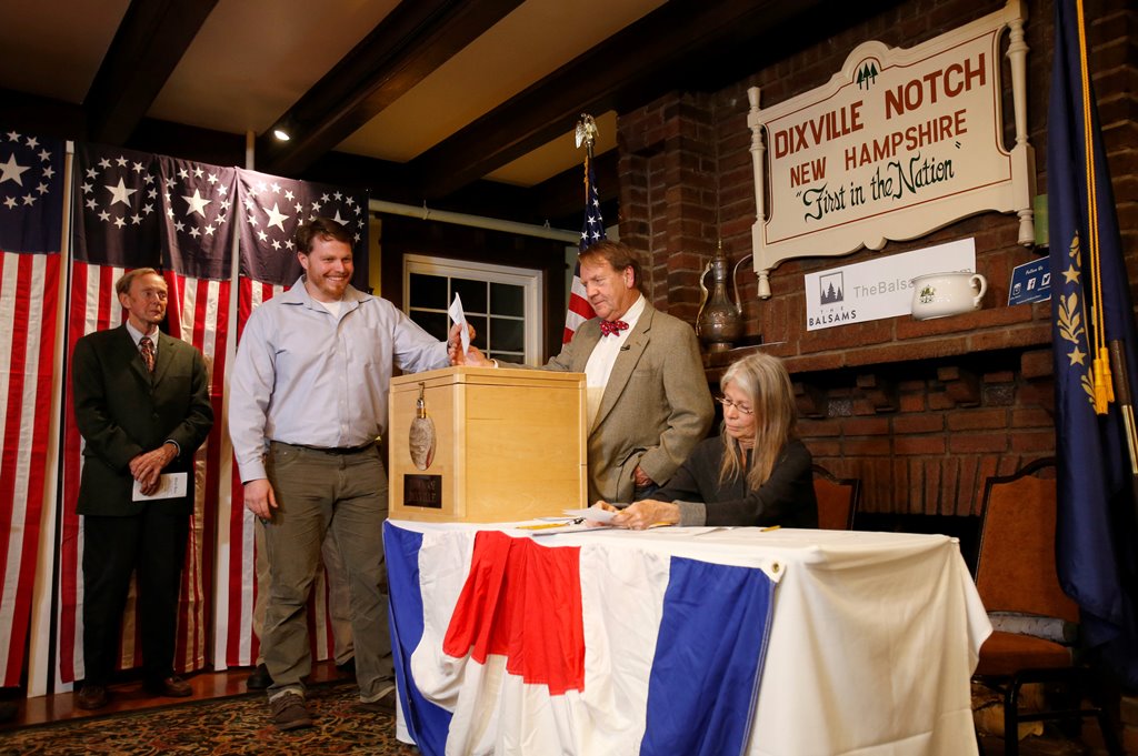 Clay Smith is the first to cast his ballot in the US presidential election at midnight in tiny Dixville Notch, New Hampshire, November 8, 2016. Reuters/Mary Schwalm