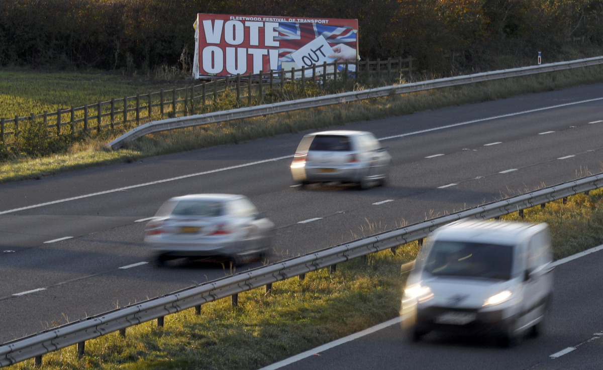 A poster urging people to leave the EU is seen in a field near Blackpool, Britain November 7, 2016. REUTERS/Phil Noble