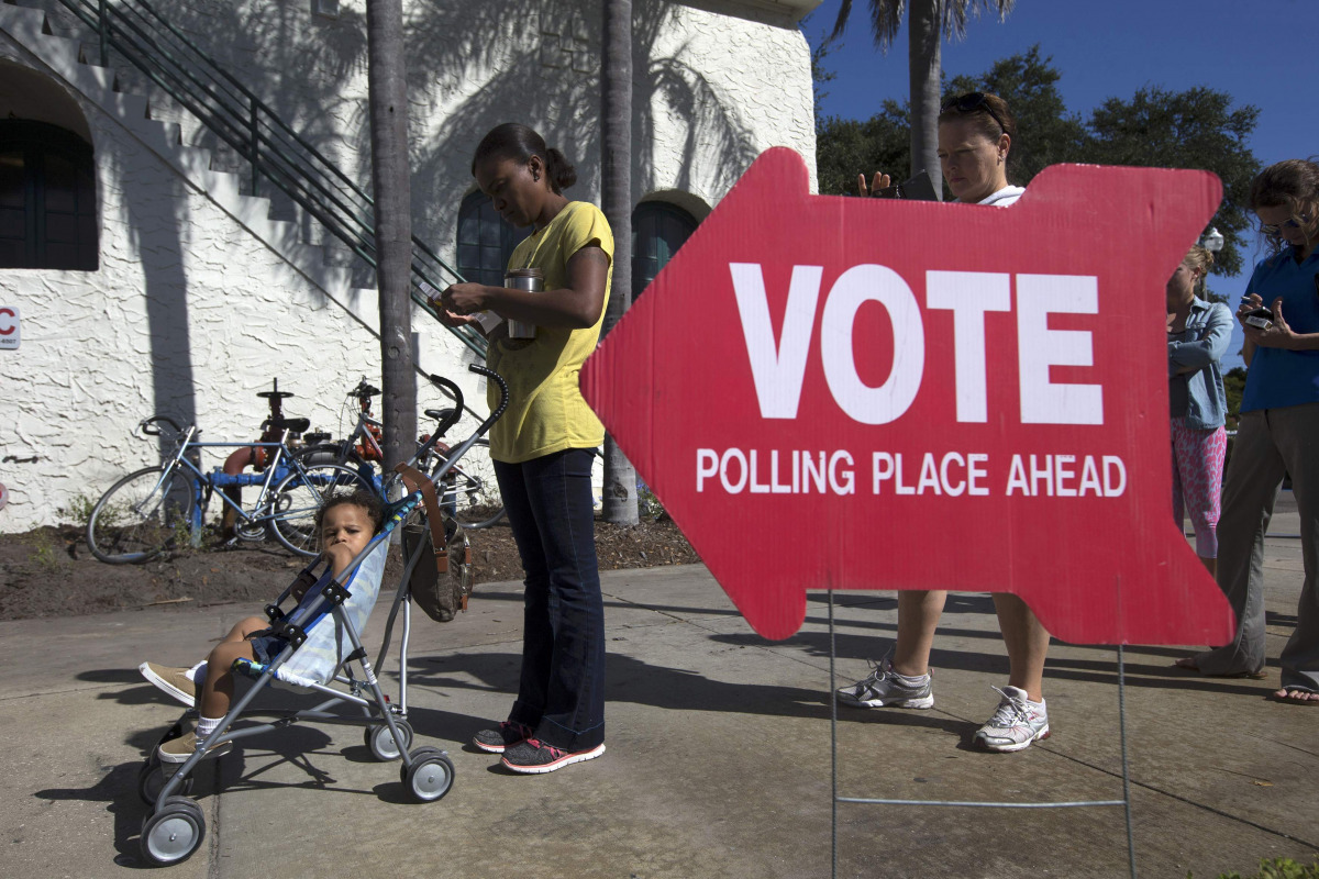 Voters head to the polls during the U.S. presidential election in St. Petersburg, Florida, U.S. November 8, 2016. REUTERS/Scott Audette
