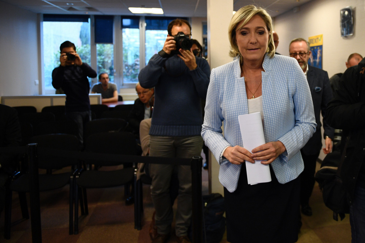 
President of the French far-right party and presidential candidate for the 2017 French Presidential elections Marine Le Pen leaves after delivering a speech during a press conference on november 9, 2016 in the party headquarters inNanterre, near Paris, 