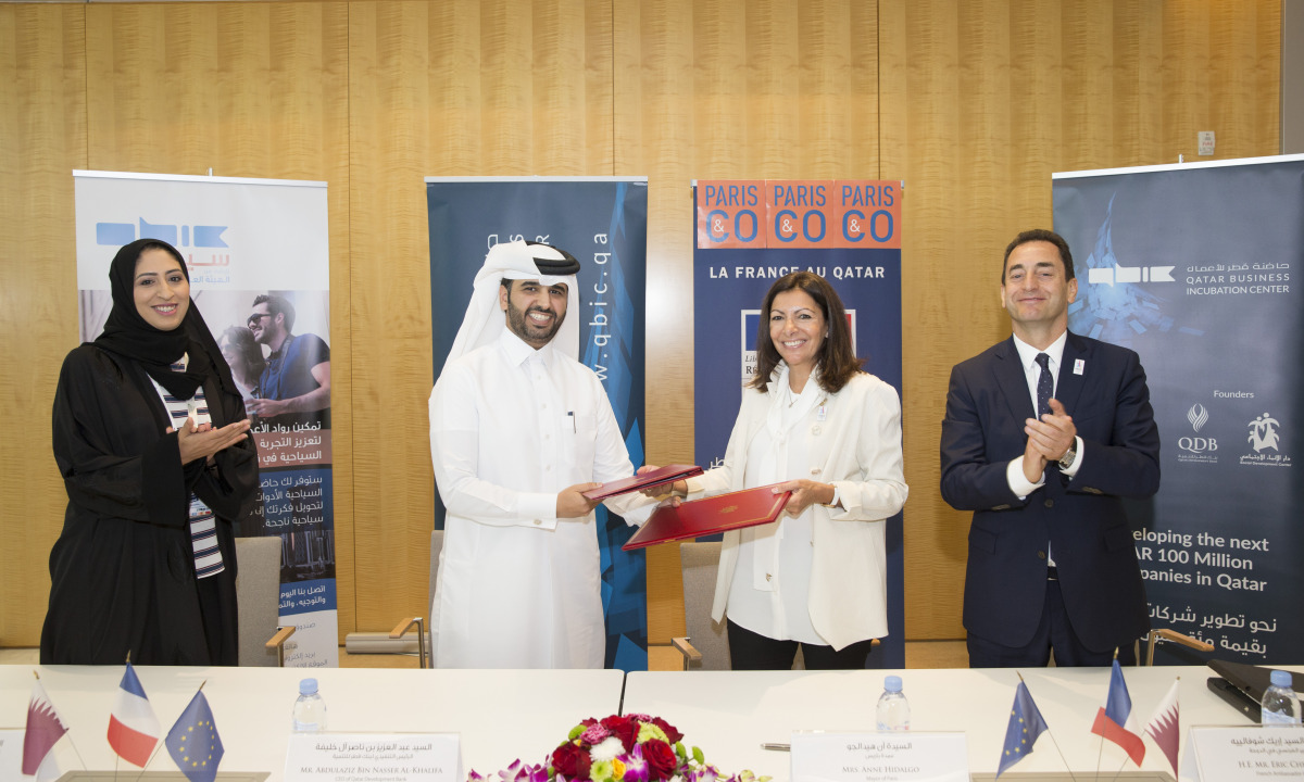 Abdulaziz bin Nasser Al Khalifa (second left), Chairman of QBIC and CEO of QDB and Mayor of Paris, Anne Hidalgo (third left) and Eric Chevallier, French Ambassador to Qatar (right) at the signing ceremony  yesterday.