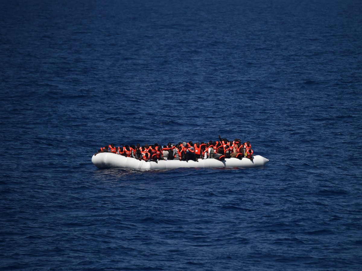  This file photo taken on May 24, 2016 shows refugees waiting on a rubber boat to be rescued during an operation at sea with the Aquarius, a former North Atlantic fisheries protection ship now used by humanitarians SOS Mediterranee and Medecins Sans Front