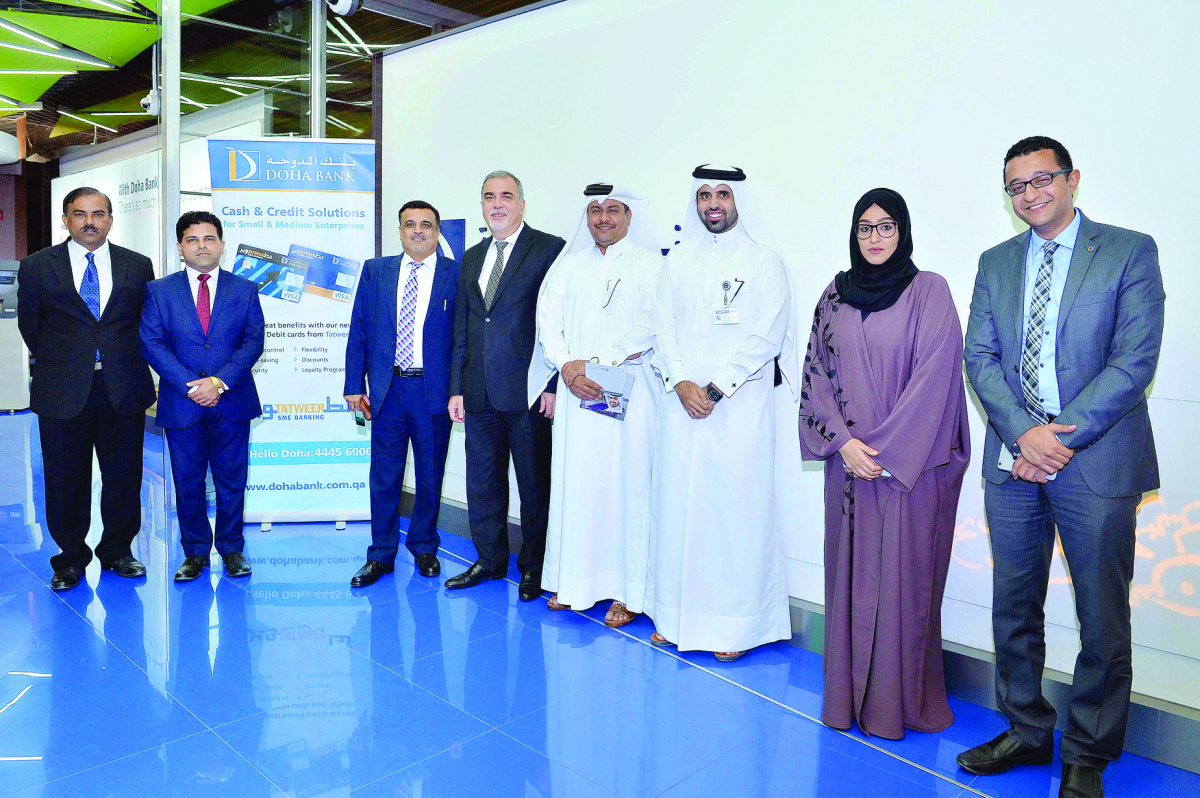 QDB and Doha Bank officials at the event. 