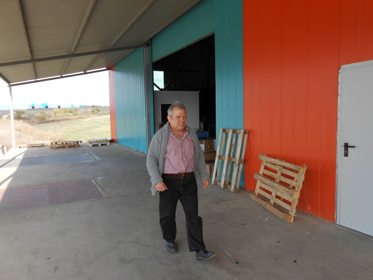 Greek businessman Yiorgos Kalaitzoglou, head of a logistic company, walks outside his firm in Bulgarian town of Petritsi, 5 km away from the Bulgarian-Greek Borders, November 7, 2016. REUTERS/Lefteris Papadimas