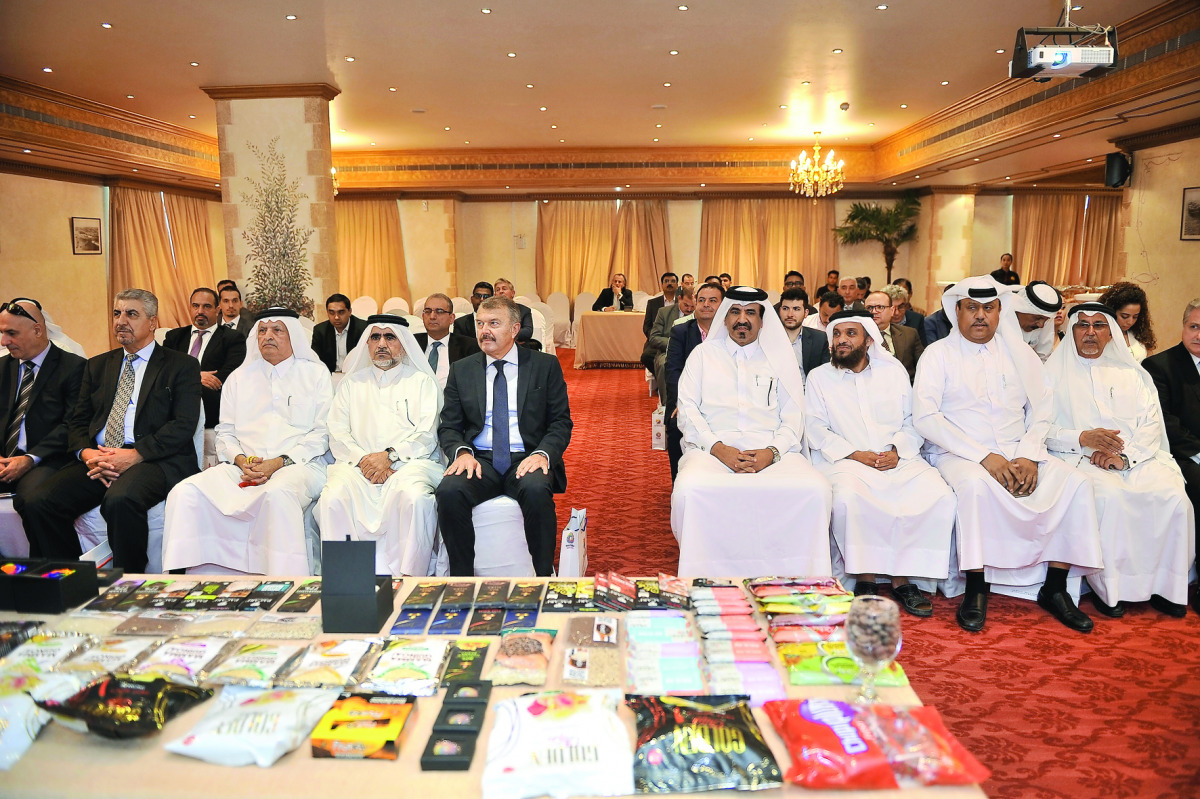 Kabalan Abisaab (fifth left), Ambassador of the Republic of Ecuador to Qatar; Mohamed bin Ahmed bin Tawar Al Kowari, Vice Chairman of Qatar Chamber, and other officials during the Qatar Chamber and Ecuador Embassy Exhibition which took place at Qatar Cham