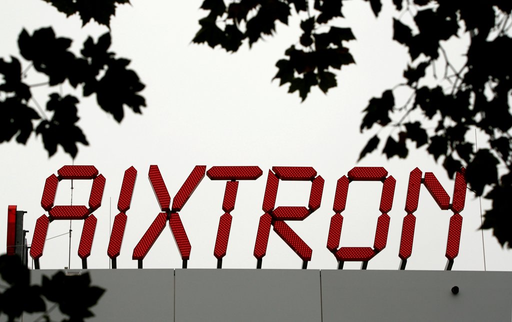 The logo of Aixtron SE is pictured on the roof of the German chip equipment maker's headquarters in Herzogenrath near the western German city of Aachen, October 25, 2016. REUTERS/Wolfgang Rattay/File Photo
