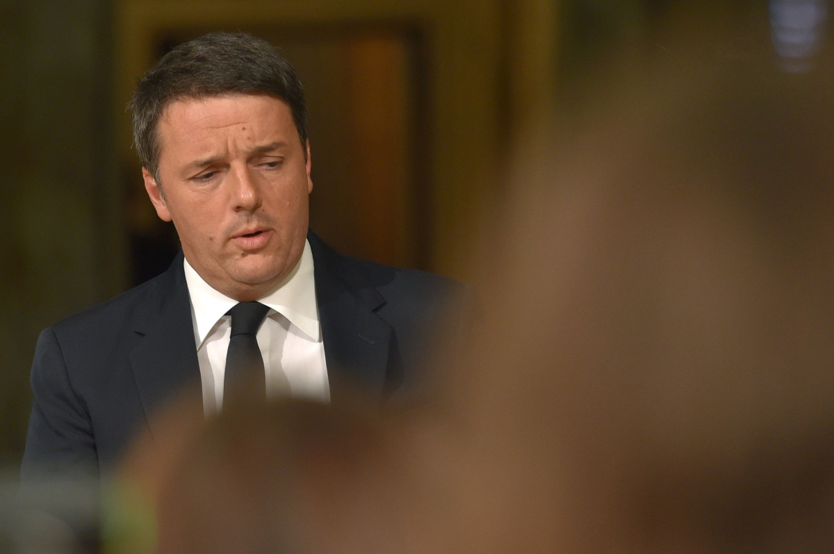 Italy's Prime Minister Matteo Renzi arriving for a press conference at the Palazzo Chigi following the results of the vote for a referendum on constitutional reforms, on December 4, 2016 in Rome. Renzi announced he would resign at 1800 GMT on December 7, 