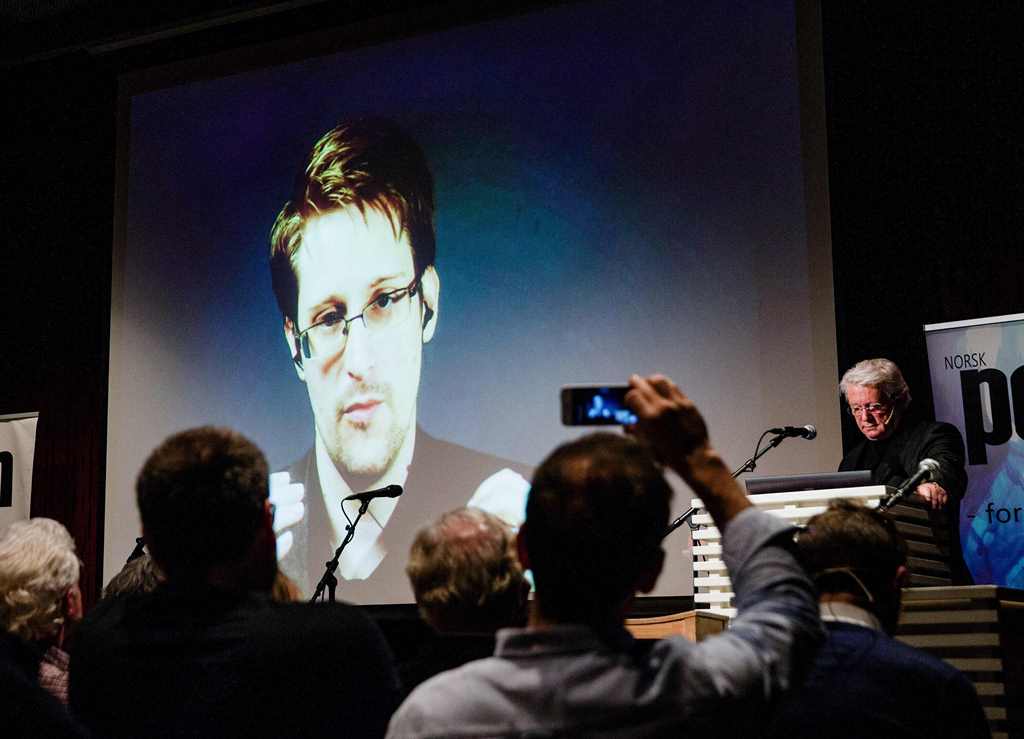 (FILES) This file photo taken on November 18, 2016 shows US whistleblower Edward Snowden, seen live from Moscow, at the Norwegian PEN event 
