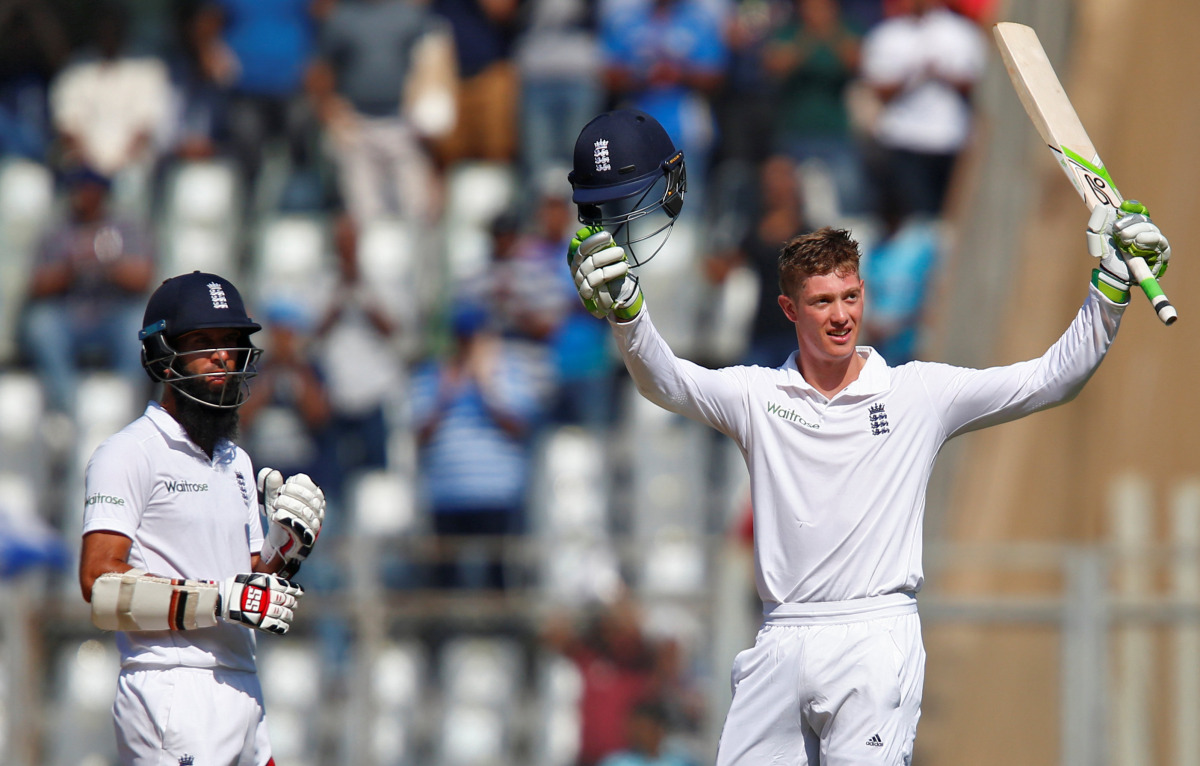 England's Keaton Jennings (R) celebrates his century as his team mate Moeen Ali looks on. (Reuters/Danish Siddiqui)