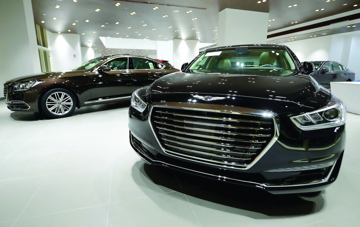 Cars of Hyundai and its luxury brand Genesis displayed at Skyline Automotive's showroom located along the B-Ring Road.