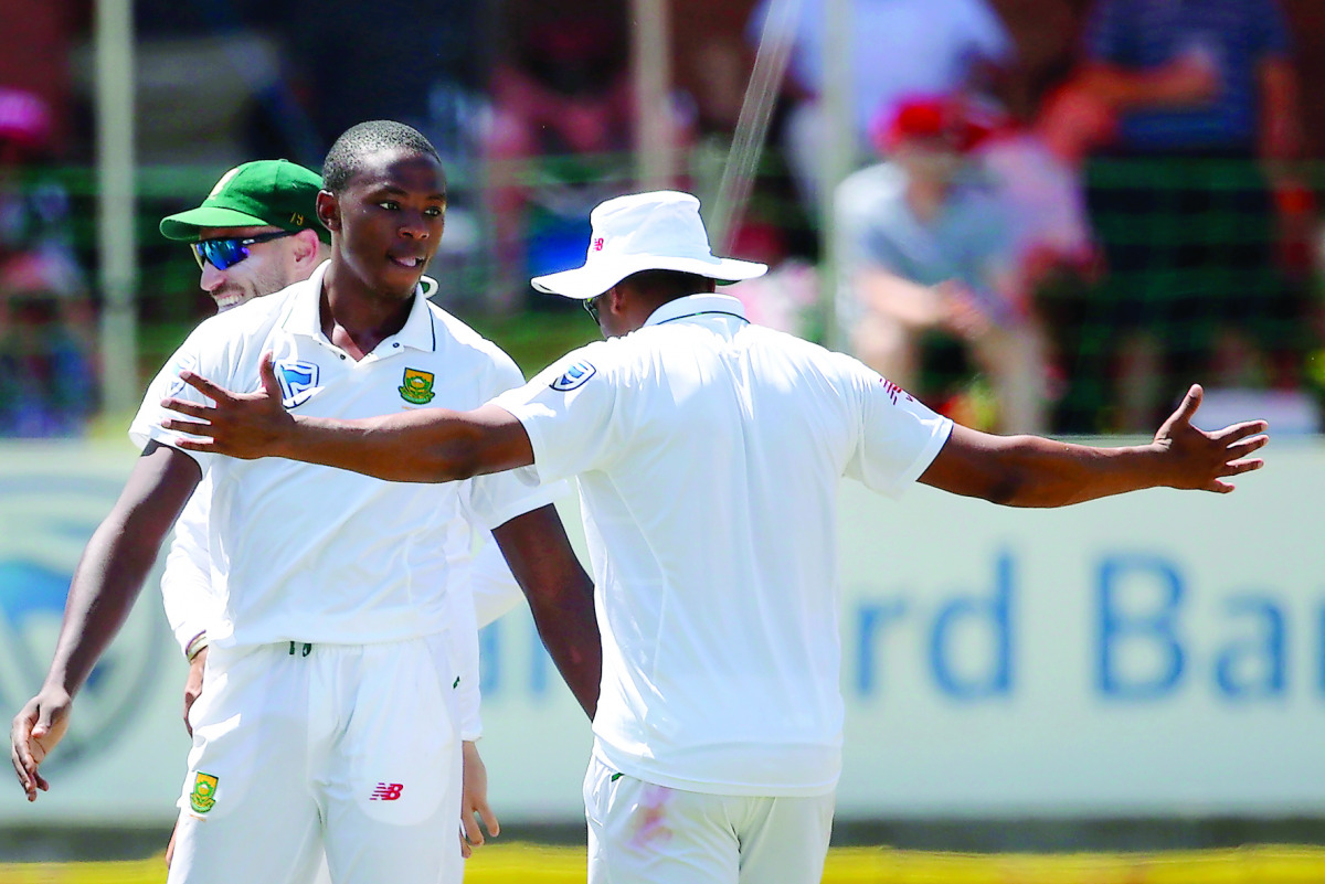 South African bowler Kagiso Rabada (centre) celebrates the dismissal of Sri Lanka batsman Angelo Mathews during the second day of the first Test match at Port Elizabeth cricket ground, South Africa, yesterday.