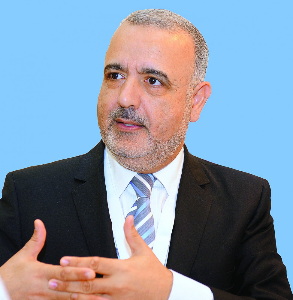 Dr Adnan Abu Dayya (left)